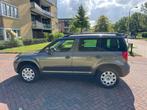 Skoda Yeti 1.2 TSI 77KW 2010 Bruin, Auto's, Skoda, Voorwielaandrijving, Stof, 4 cilinders, Bruin