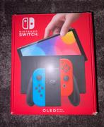 Nintendo Switch Oled met Joy-Con Wheel Pair en garantie, Ophalen of Verzenden, Zo goed als nieuw, Met 1 controller, Switch OLED