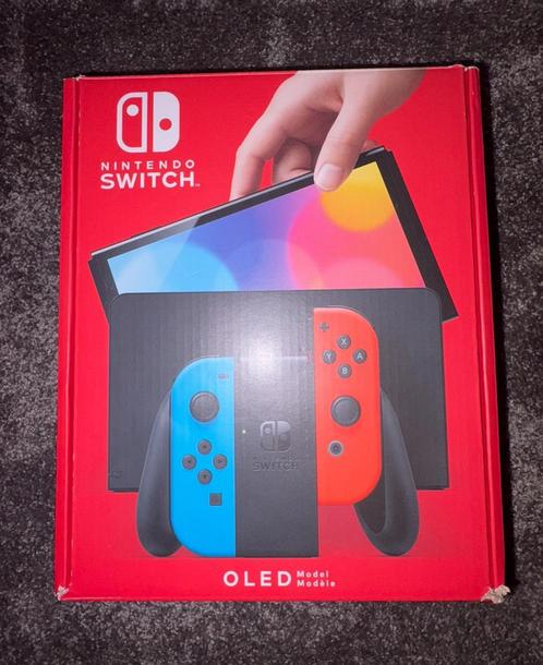 Nintendo Switch Oled met Joy-Con Wheel Pair en garantie, Spelcomputers en Games, Spelcomputers | Nintendo Switch, Zo goed als nieuw