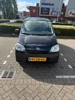 Daihatsu Cuore 1.0 3D 2006 Zwart, Auto's, Daihatsu, Navigatiesysteem, Stof, 600 kg, Zwart