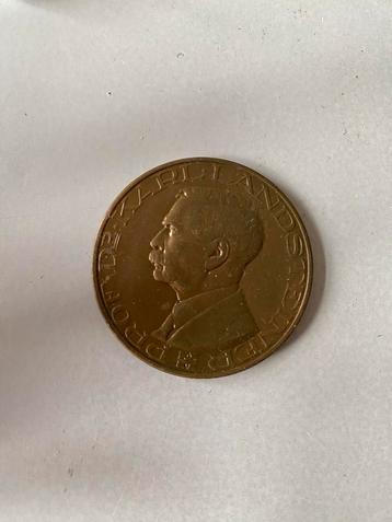KARL LANDSTEINER PENNING.(diam. 4cm) beschikbaar voor biedingen
