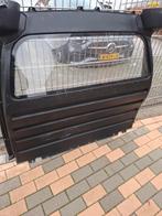 Vw caddy tussenwand., Ophalen