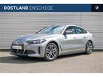 BMW i4 eDrive40 / Trekhaak / Achteruitrijcamera / Comfort Ac, Auto's, BMW, Achterwielaandrijving, Gebruikt, Zwart, Met garantie (alle)