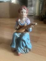 Beeldje vrouw met de luit, Ophalen