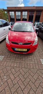 Hyundai i20 1.2 5-DRS 2012 Rood, Auto's, 4 cilinders, Origineel Nederlands, Handgeschakeld, Grijs