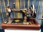 Antieke naaimachine, Ophalen