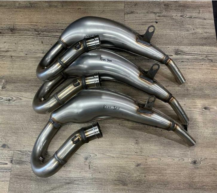 Nieuwe uitlaatbocht KTM 250/300 2-takt RVS – OEM 55705109033, Motoren, Tuning en Styling, Ophalen of Verzenden