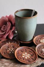 Set van 6 gesneden teakhouten onderzetters, Ophalen of Verzenden, Zo goed als nieuw, Glas of Kopje