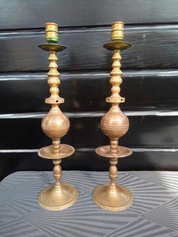 Koperen kandelaars. beschikbaar voor biedingen