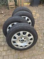 Mini stalen velgen met winterbanden, Ophalen