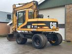 Caterpillar M312 (bj 1997), Graafmachine