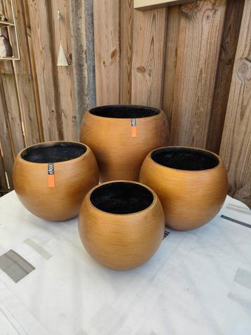 Set van 4 kunstof bloempotten van Capi goudkleur beschikbaar voor biedingen