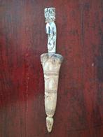 Indonesisch benen mesje en schede, Ophalen