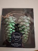 2 kerst dennenappels, Ophalen