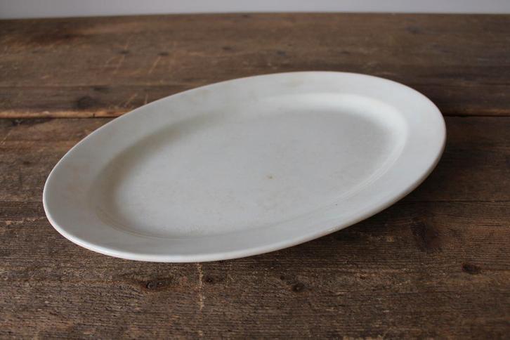 Brocante serveerschaal ovaal SC Nr.7 *Pronck & Praal*, Antiek en Kunst, Curiosa en Brocante, Ophalen of Verzenden