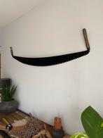 Oude handzaag, Ophalen