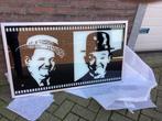 Spiegel schilderij Laurel en Hardy, Ophalen