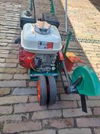 Powertrim kantensnijder, Ophalen