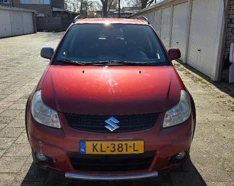Suzuki SX4 1.6 AUT 2010 Rood, Stof, Zwart, 4 cilinders, 49 €/maand