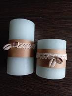 Te koop lichtblauwe stompkaarsen met schelpen., Ophalen, Nieuw, Overige materialen, Minder dan 25 cm