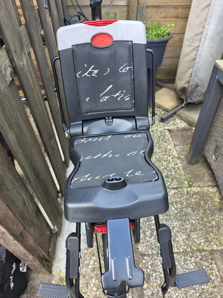 Fietsstoeltje achter bobike, Ophalen