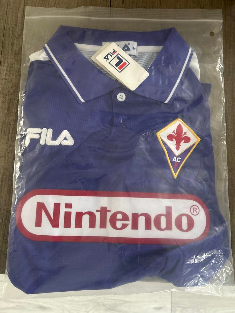 Fila AC Fiorentina Nintendo shirt, Kleding | Heren, T-shirts, Ophalen of Verzenden, Nieuw, Maat 48/50 (M), Paars