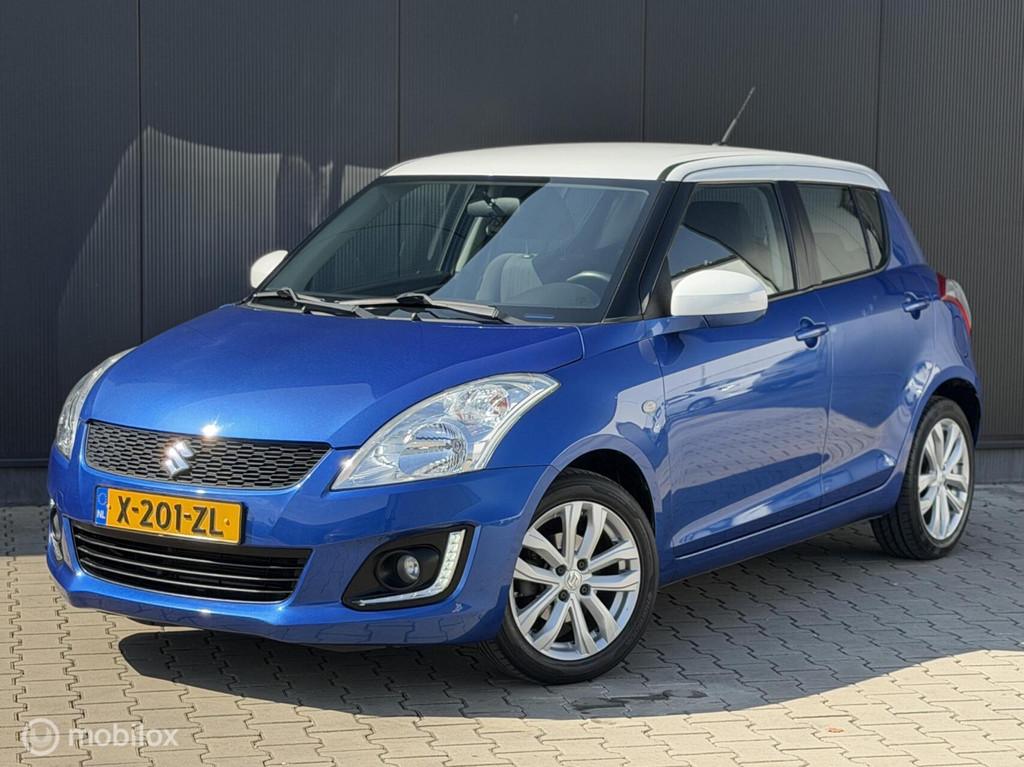 Suzuki Swift 1.2 Dynamic | AUTOMAAT | AIRCO | CRUISE |, Auto's, Suzuki, Stof, 4 cilinders, 965 kg, Blauw