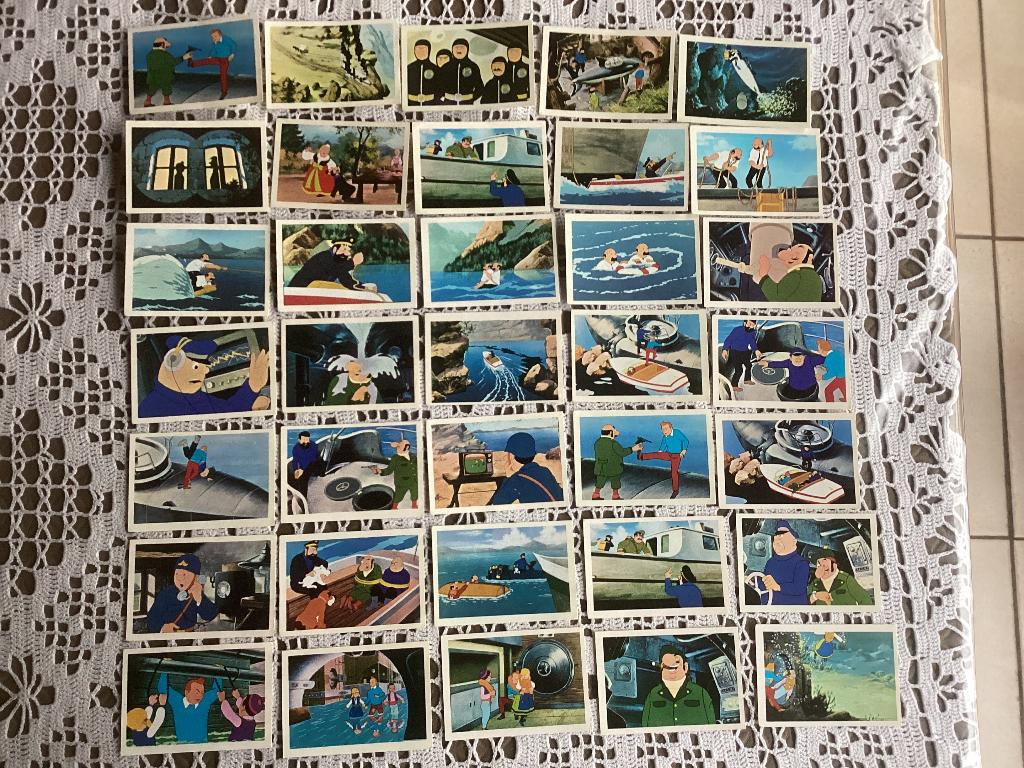 74 plaatjes KUIFJE en het haaienmeer Vanderhout 1973, Ophalen of Verzenden, Kuifje, Gebruikt, Plaatje, Poster of Sticker