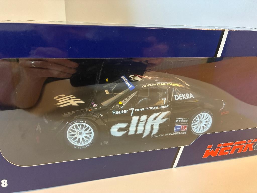 19500: Opel Calibra V6 4X4 DTM - M.Reuter - Hockenheim 1996, Hobby en Vrije tijd, Modelauto's | 1:18, Auto, Nieuw, Willeckstr. 7, D-35614 Asslar, Germany