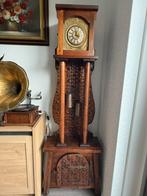 Staande klok, Ophalen