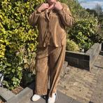 Goud pak  46/48 mt S  Curviss, Ophalen of Verzenden, Nieuw, Pak of Jurk