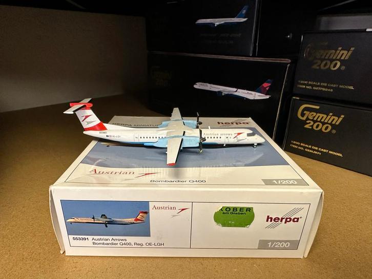 Herpa Austrian Arrows 1:200 Bombardier Q400, Verzamelen, Luchtvaart en Vliegtuigspotten, Zo goed als nieuw, Schaalmodel, Ophalen of Verzenden