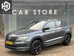 Skoda Karoq 1.5 TSI DSG Sportline Pano|Sfeer|Canton|Dealer O, Stof, 4 cilinders, 150 pk, Bedrijf