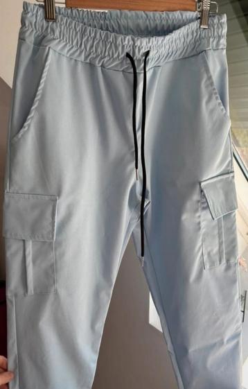 Lichtblauwe cargo broek. Als nieuw en uniek! beschikbaar voor biedingen