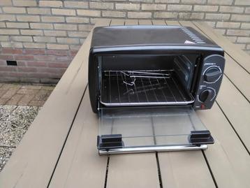 Klein caravan oventje beschikbaar voor biedingen