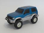 Mitsubishi Pajero Tamiya, bouwpakketje met motor, 1:32 izgst, Ophalen of Verzenden, Gebruikt, Auto, Overige merken