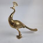 &Klevering Pauw goudkleurig, Ophalen