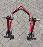 Paddock standaard achterwiel motor, Motoren, Ophalen