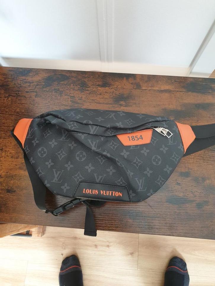 Louis Vuitton Heuptas - Zwart/Oranje, Sieraden, Tassen en Uiterlijk, Tassen | Damestassen, Gebruikt, Handtas, Zwart, Ophalen
