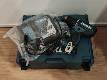 Makita boormachine in mbox met snellader beschikbaar voor biedingen
