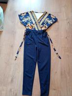 Mooie donkerblauwe jumpsuit mt 42, Kleding | Dames, Jumpsuits, Ophalen of Verzenden, Zo goed als nieuw, Maat 42/44 (L), Blauw