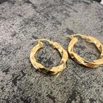18 karaat gouden wokkels oorbellen nieuw, Ophalen of Verzenden