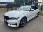 BMW 3-serie Touring 330e xDrive High Executive Laser Pano 36, Auto's, BMW, Achterwielaandrijving, Gebruikt, Euro 6, 4 cilinders