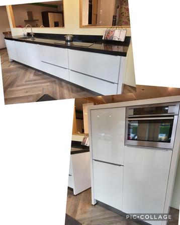 Witte hoogglans NOLTE keuken met separate kasten,stenen blad beschikbaar voor biedingen
