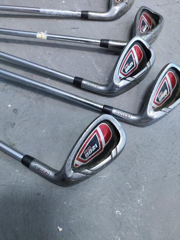 Golfclubhouder in hars en Wilson golfclubs beschikbaar voor biedingen