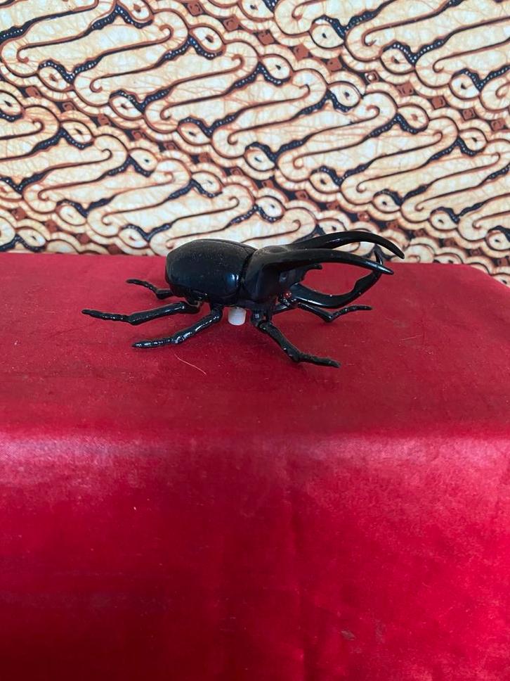 VINTAGE (80er jaren) TOMY PLASTIC OPWIND NEUSHOORNKEVER., Verzamelen, Speelgoed, Zo goed als nieuw, Ophalen of Verzenden