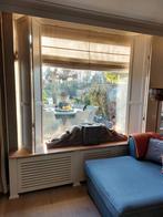 2 houten luiken, Ophalen