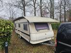 Overdak voor caravan, Ophalen