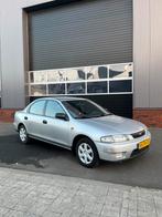 Mazda 323 1.5 SDN LX 1997 Grijs, Voorwielaandrijving, Stof, 4 cilinders, 400 kg