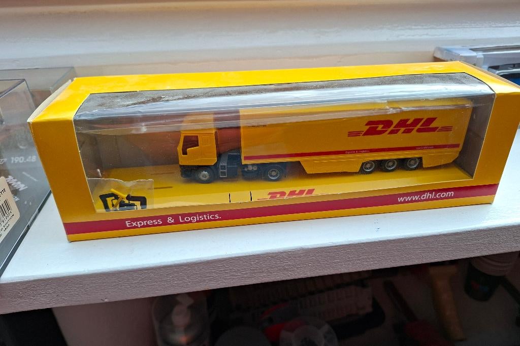 Iveco EuroTech DHL, Hobby en Vrije tijd, Modelauto's | 1:87, Ophalen of Verzenden, Nieuw, Bus of Vrachtwagen, Rietze